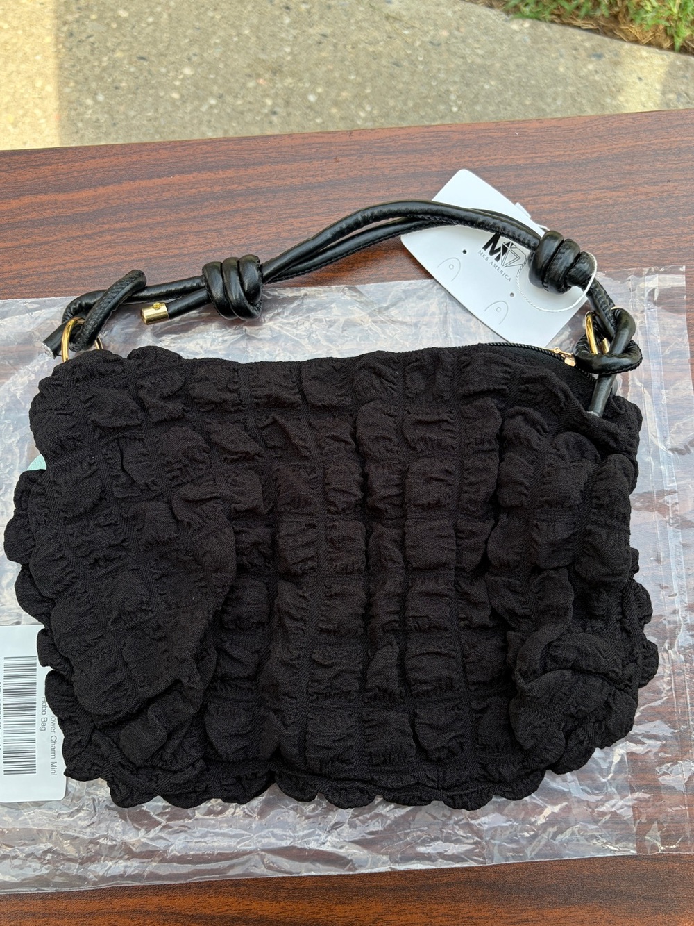 MKS America Black Textured Mini Hobo Bag Flower Charm Knotted Handle NWT